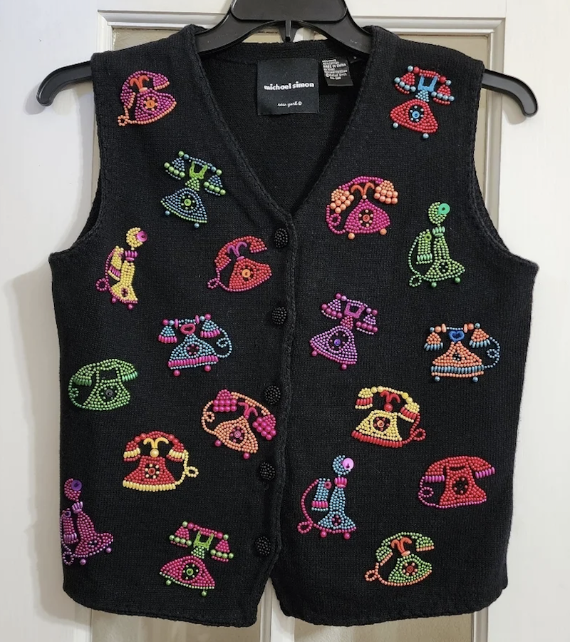 black button-up vest covered in old-fashioned phones made with colorful beads