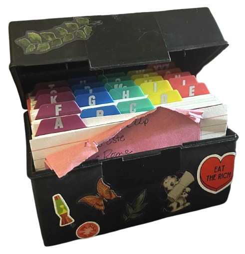 black index card box with colorful letter tabs