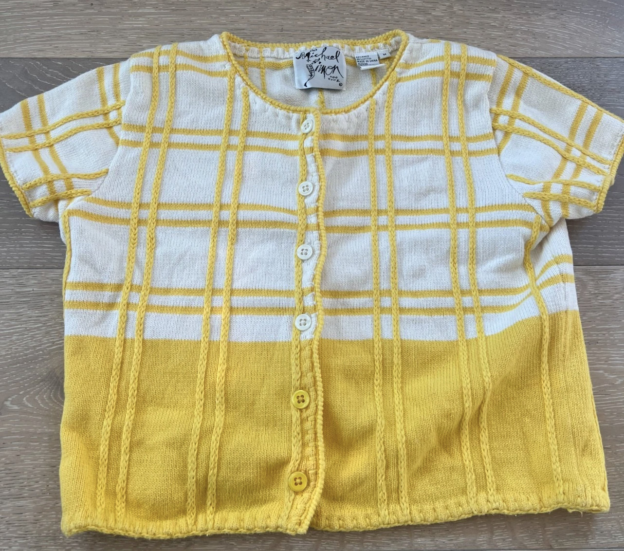 white short-sleeved cardigans with a yellow grid