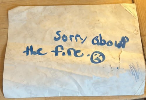 a note that says Sorry about the fire :(