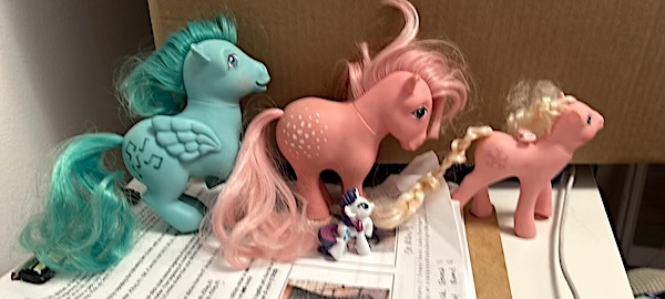 a group of My Littly Pony toys