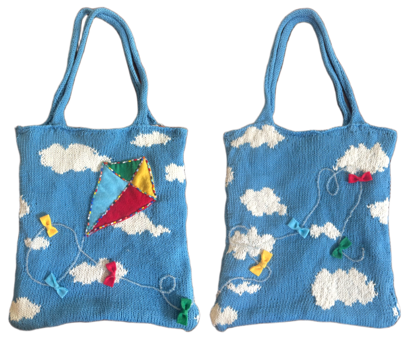 Blue knitted tote with colorful felt kite applique, a beaded kite string, and colorful ribbons